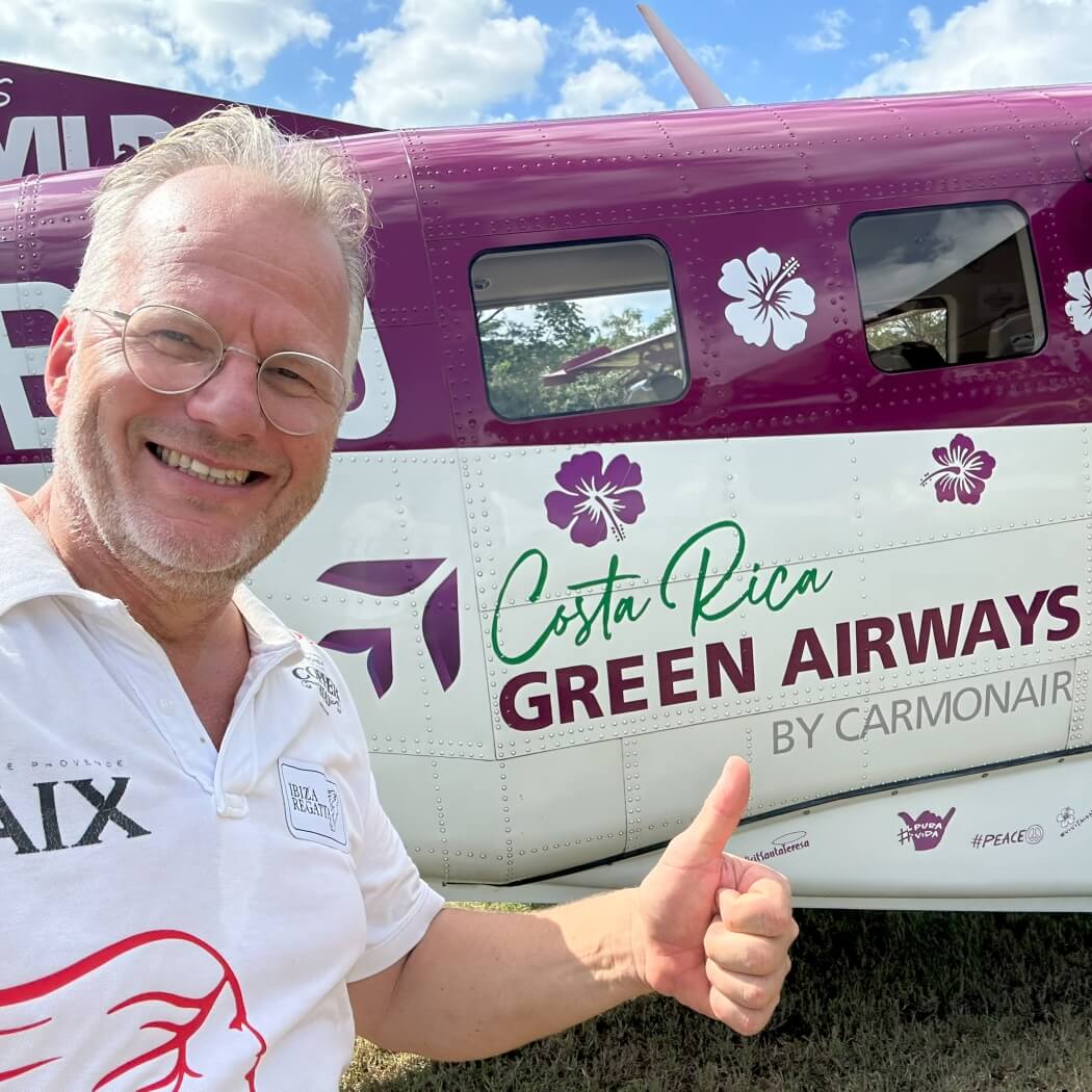 Pieter in front of a Green Airways plane