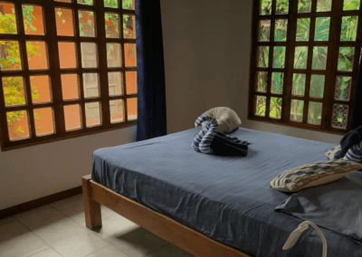 Double bed at Casita Azul in Samara Beach